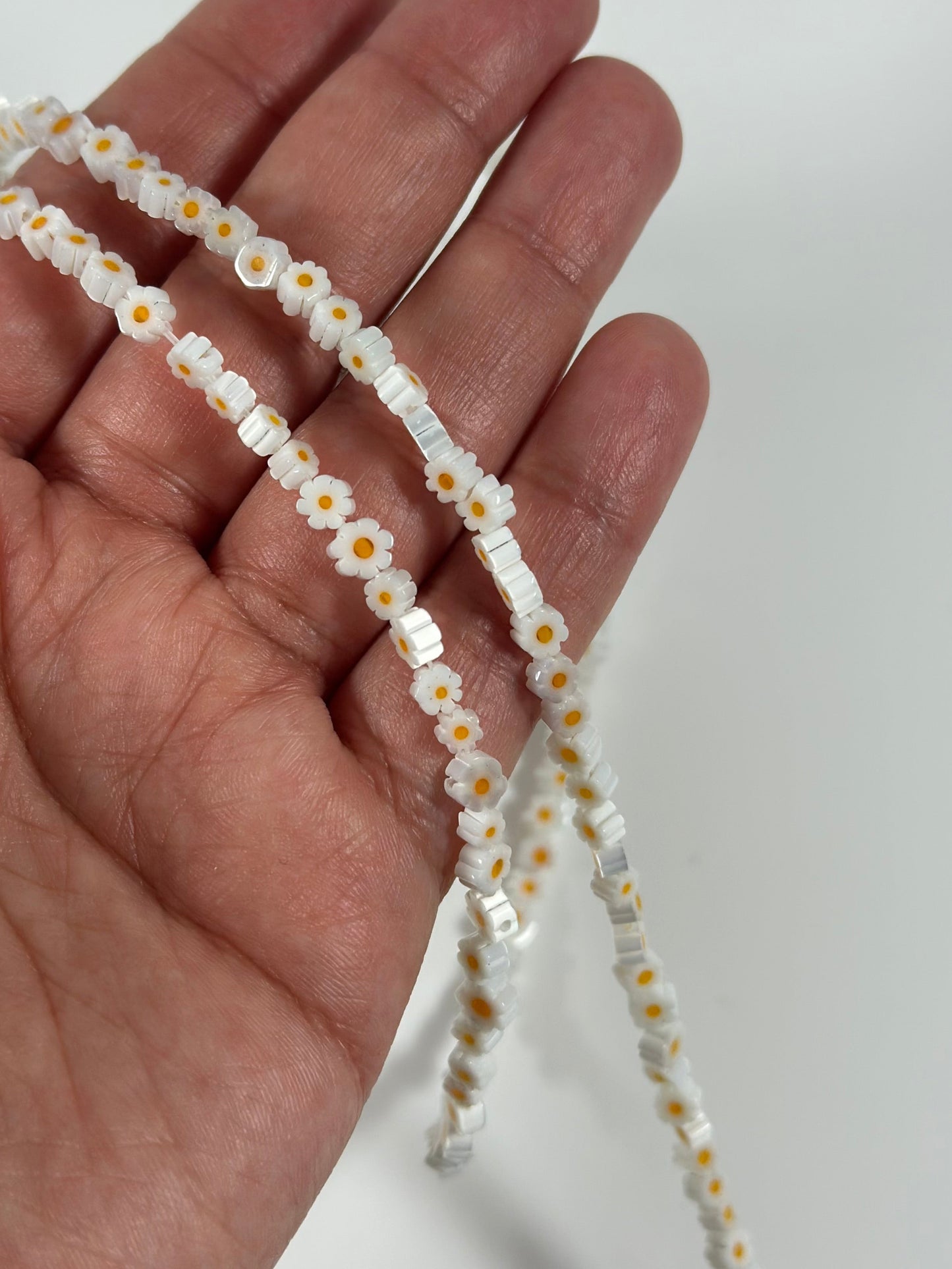 Perles Marguerite en verre