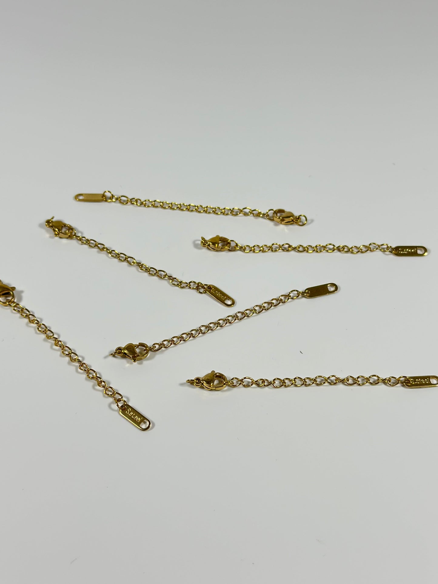 Fermoirs avec extensions