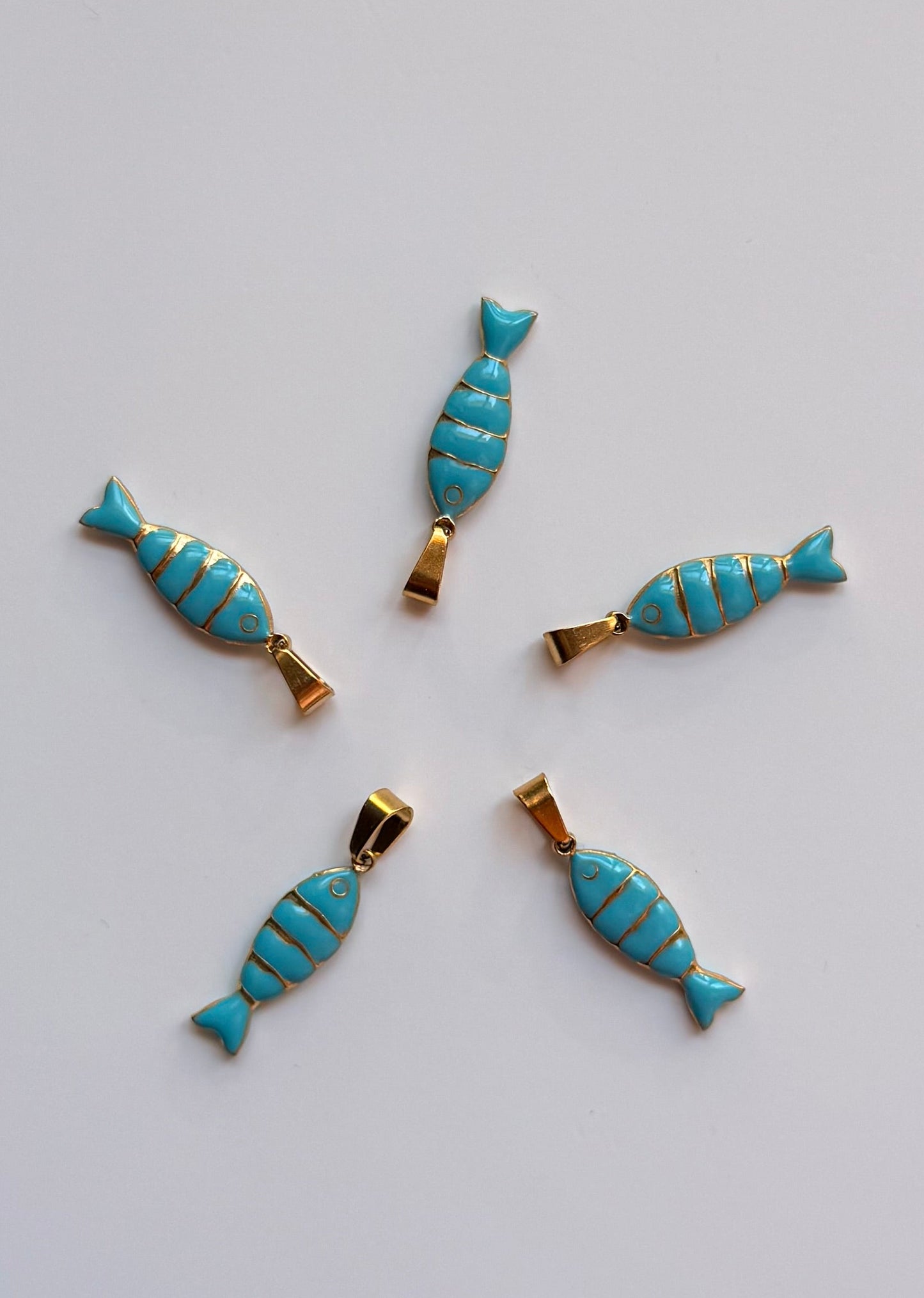 Pendentifs en acier inoxydable ‘Poissons’(Vendu a l’unité )