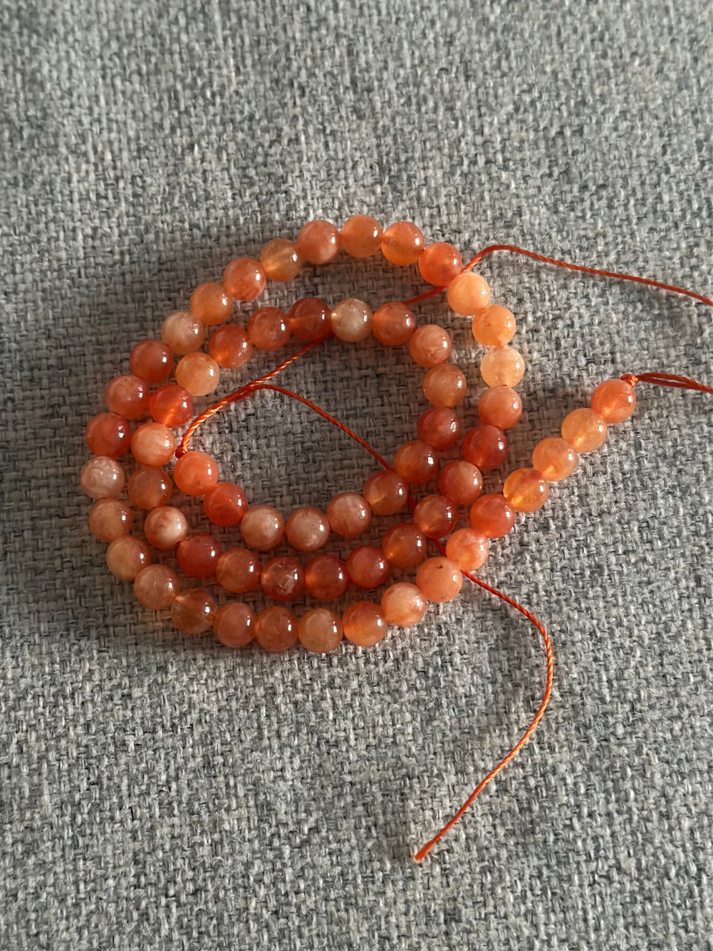 Perles en pierre orange jade