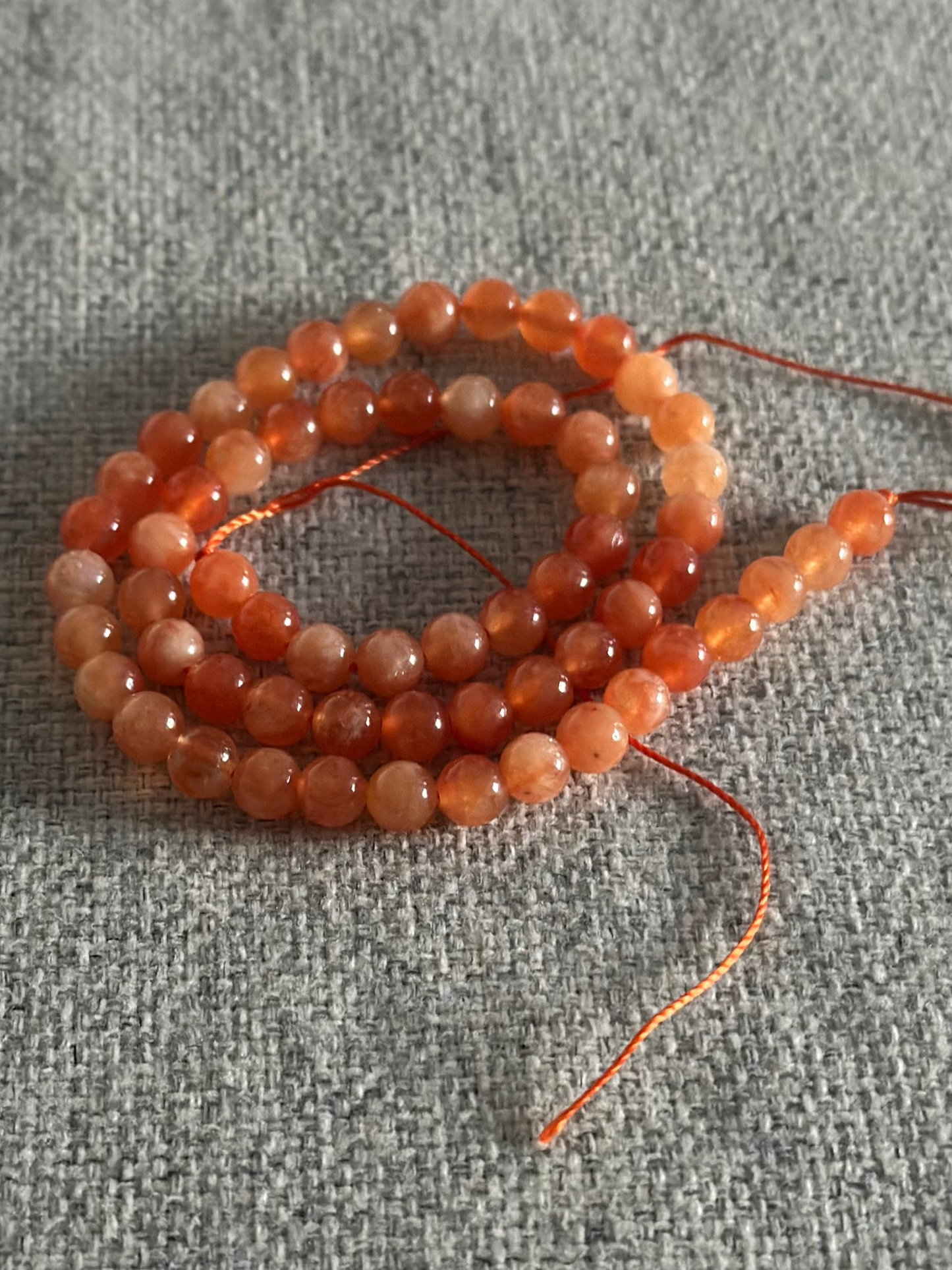 Perles en pierre orange jade