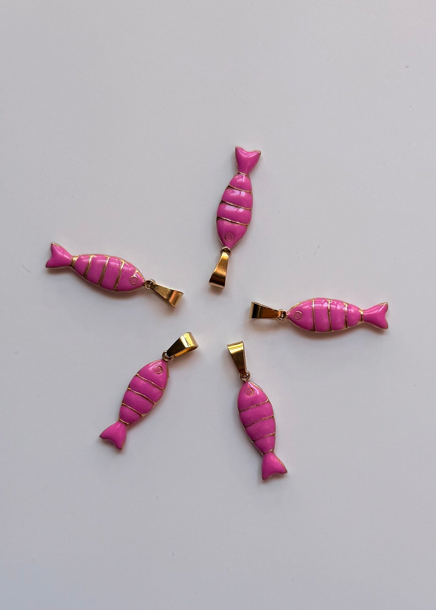 Pendentifs en acier inoxydable ‘Poissons’(Vendu a l’unité )